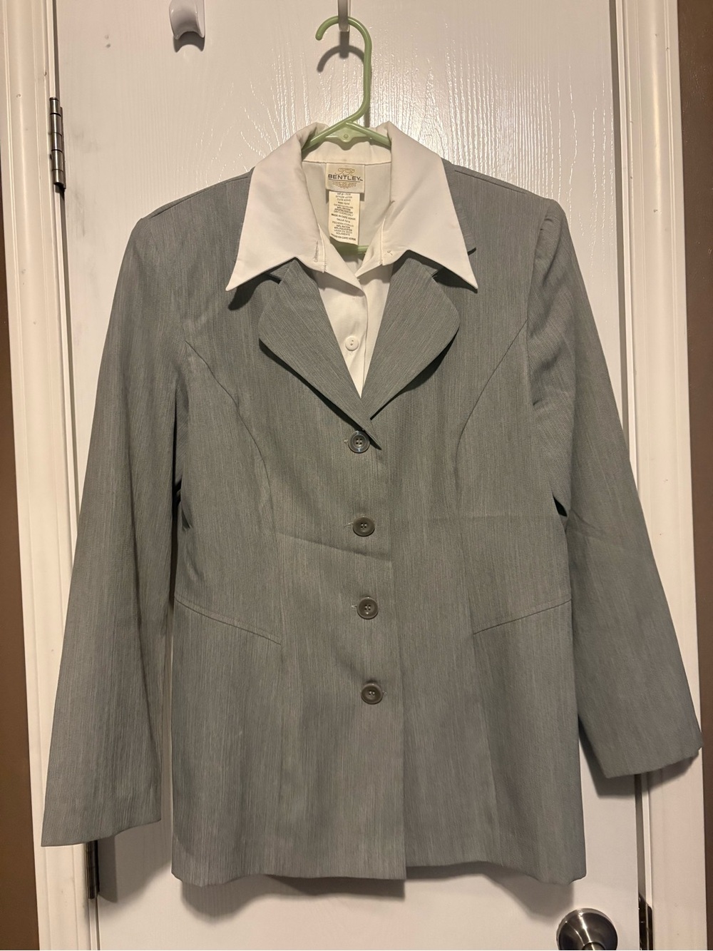 Classic Women's Light Gray Blazer Jacket and Skirt set.